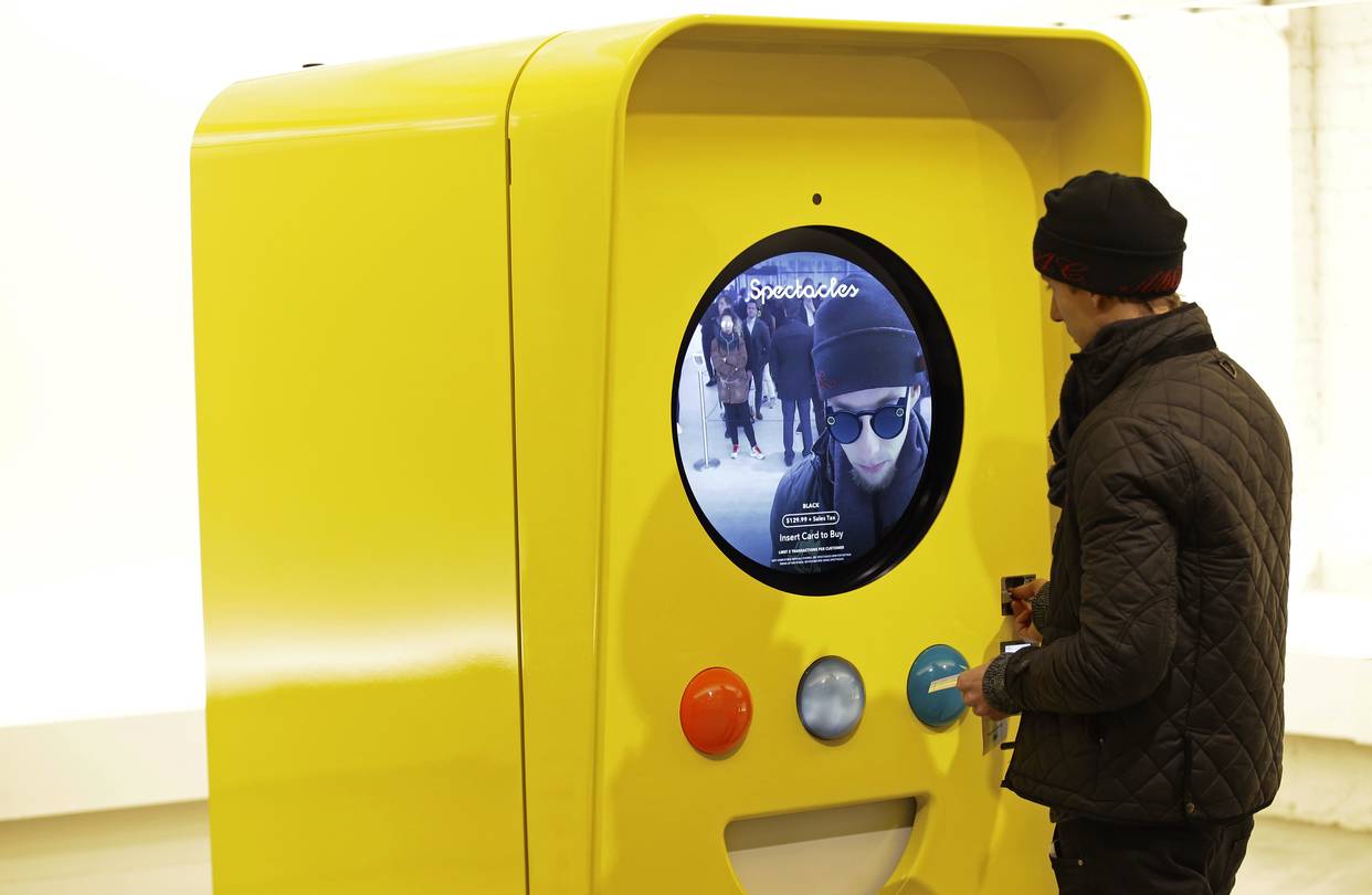 Henri Nekmouche from Sweden purchases Snapchat Spectacles from a vending machine in New York last month. Until three months ago, Snap was known simply for its ephemeral messaging app, Snapchat. Then it dove into hardware.